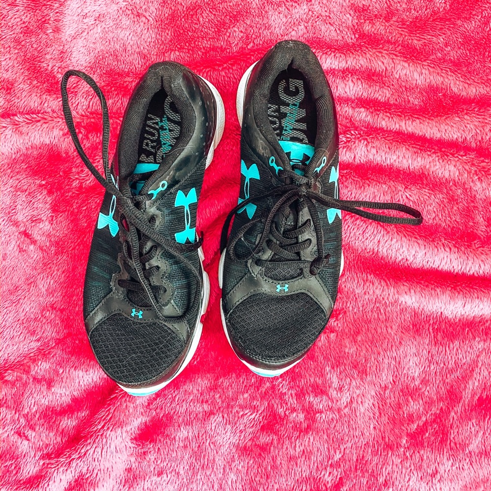 Black and light blue under armour sneakers